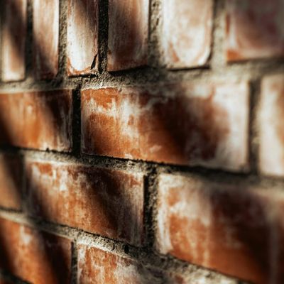 Play of light and shadow on a minimalist wall